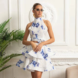 Conjunto – Top Estampado Sem Mangas + Saia Curta Plissada de Cintura Alta