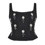 Conjunto Elegante de Top Halter com Flor de Strass e Saia de Cintura Alta – Coleção 2025