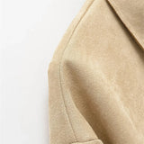 Casaco com Detalhes Vazados – Sofisticação Atemporal e Design Autoral