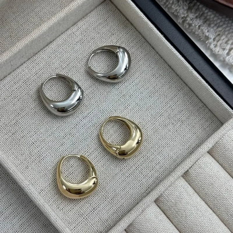 Argolas Grossas – Brilho Intenso em Aço Inoxidável