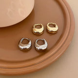 Argolas Grossas – Brilho Intenso em Aço Inoxidável